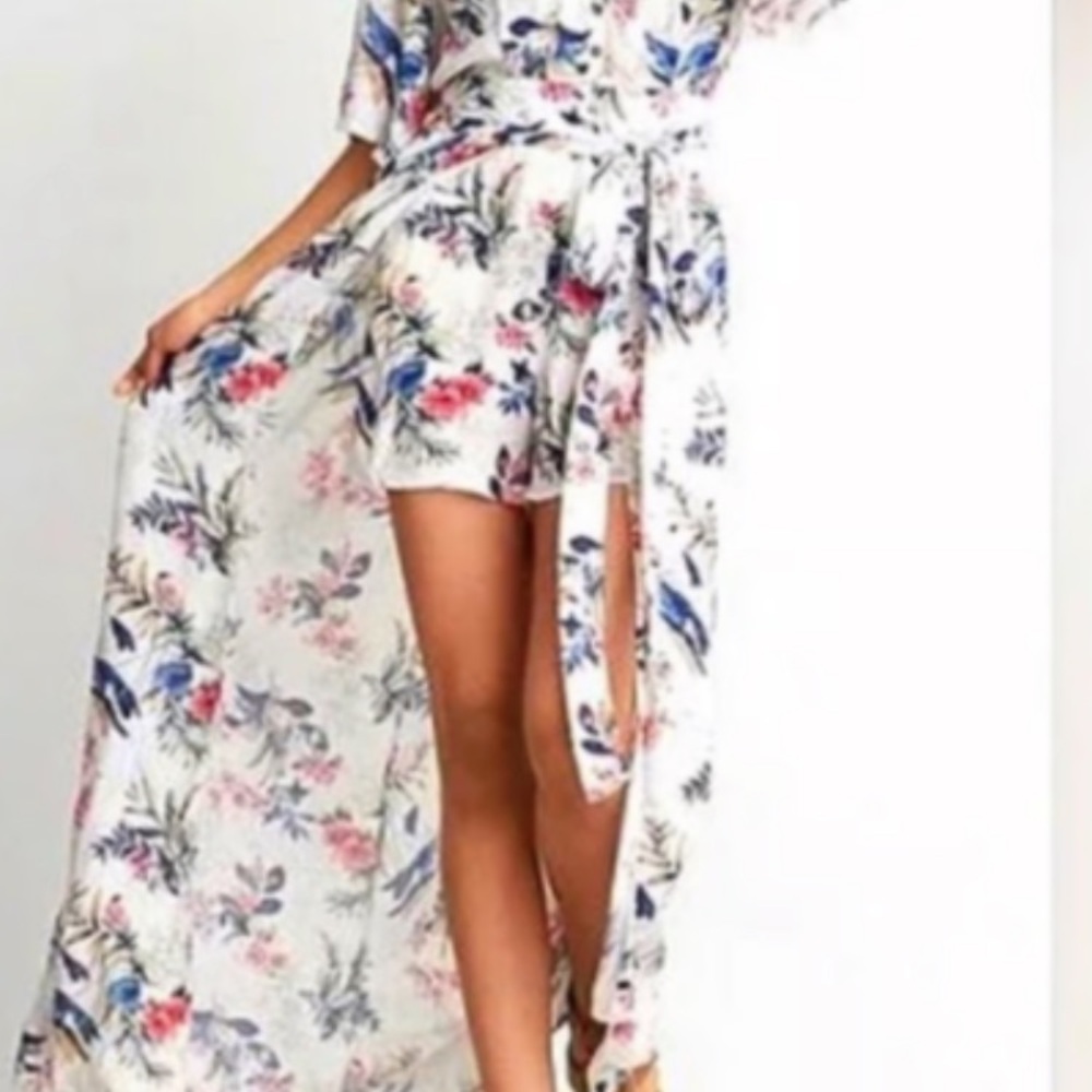 New American Eagle Outfitters Floral romper with peek a poo back